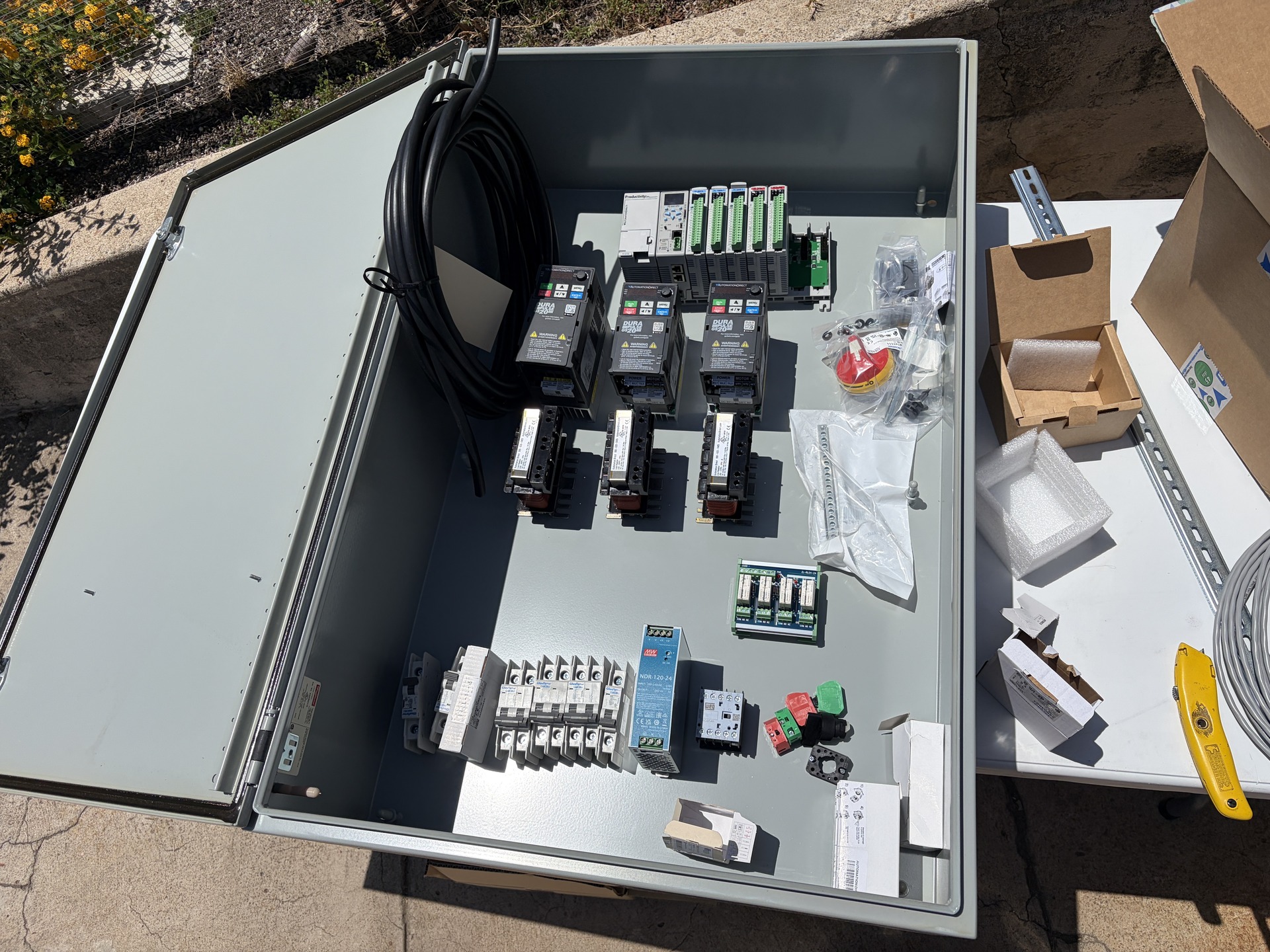 Rough layout of PLC components in a Hoffman box to start organizing the final layout